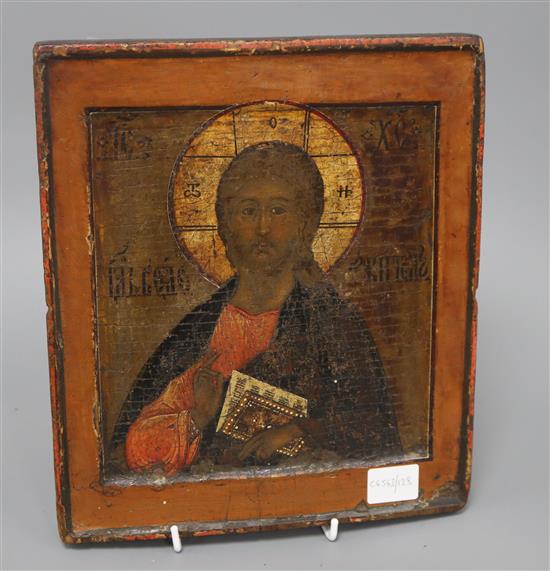 An 18th century Russian School icon of a bishop Saint, 30.5 x 23.5cm
